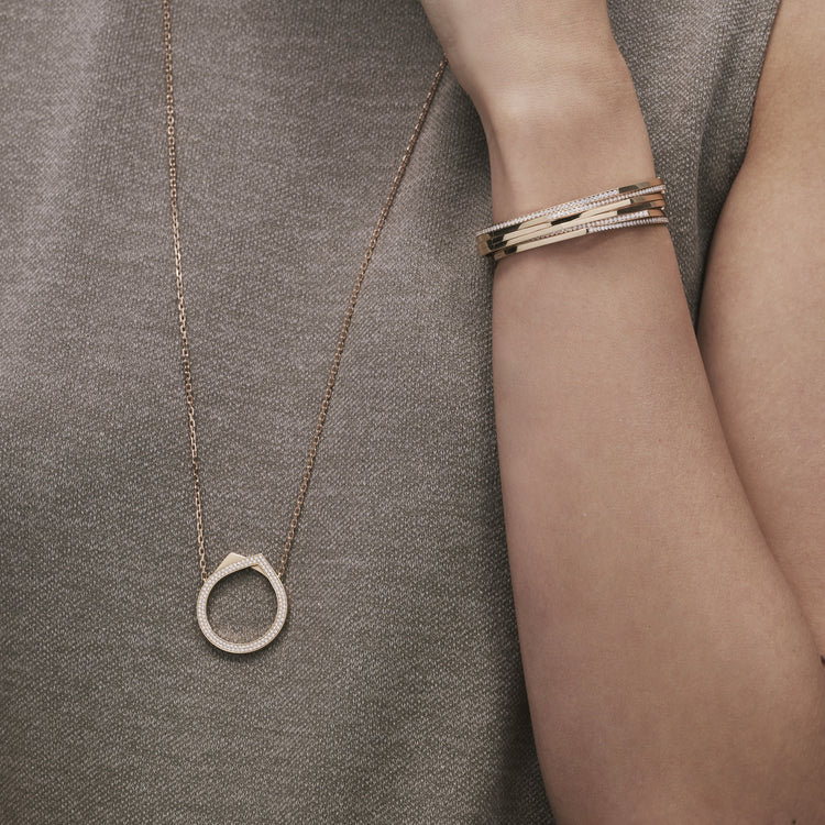 Antifer 10 years pendant in pink gold 18 carats paved with diamonds