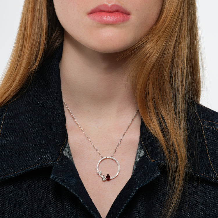 Serti sur Vide pendant set with 2 diamonds and 1 ruby
